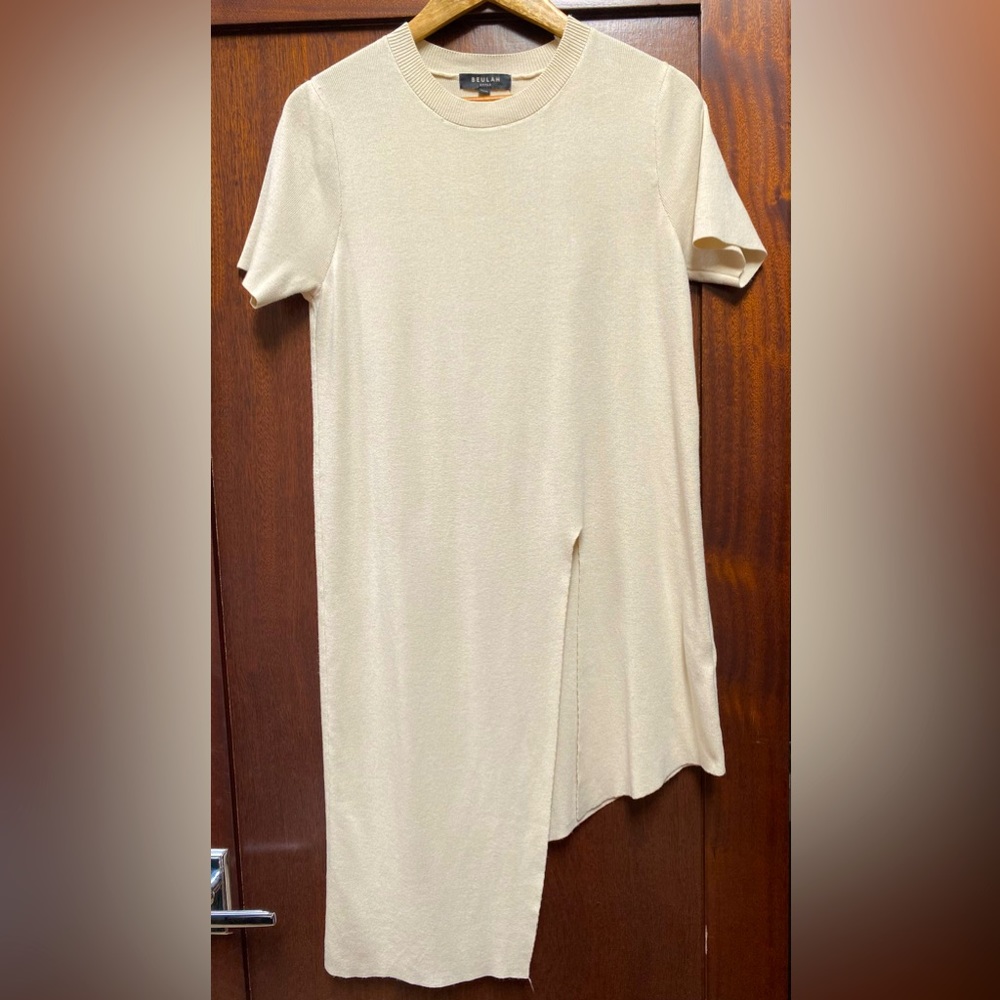 Asymmetrical long cream sweater with side slit